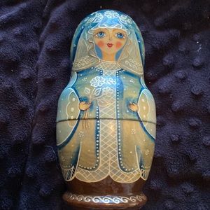Nesting doll. She’s missing her sisters, so only 1 piece